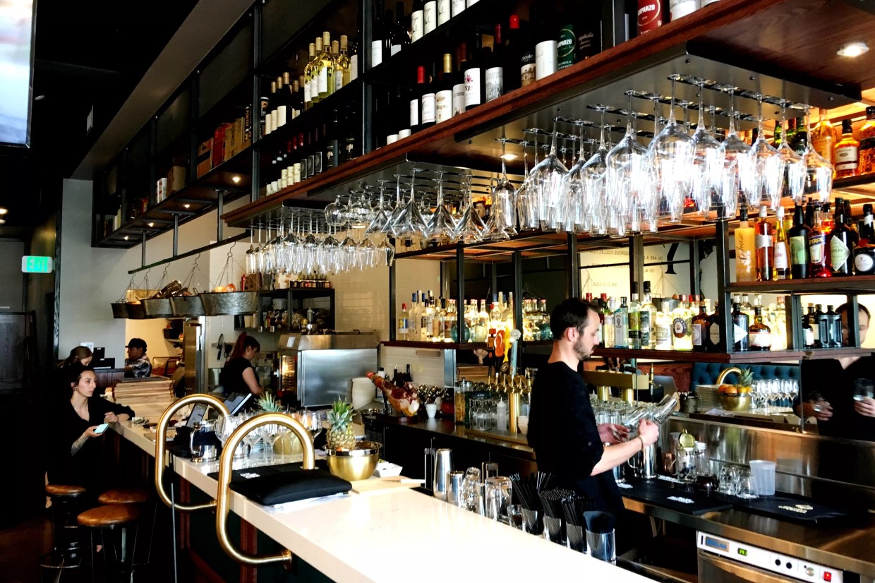 Inside Dead Battery Club bar in Denver