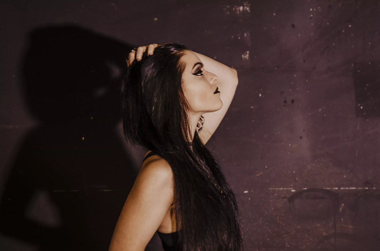 Sharone Looks at Her <i>Reflection</i> to See What Causes Her Pain