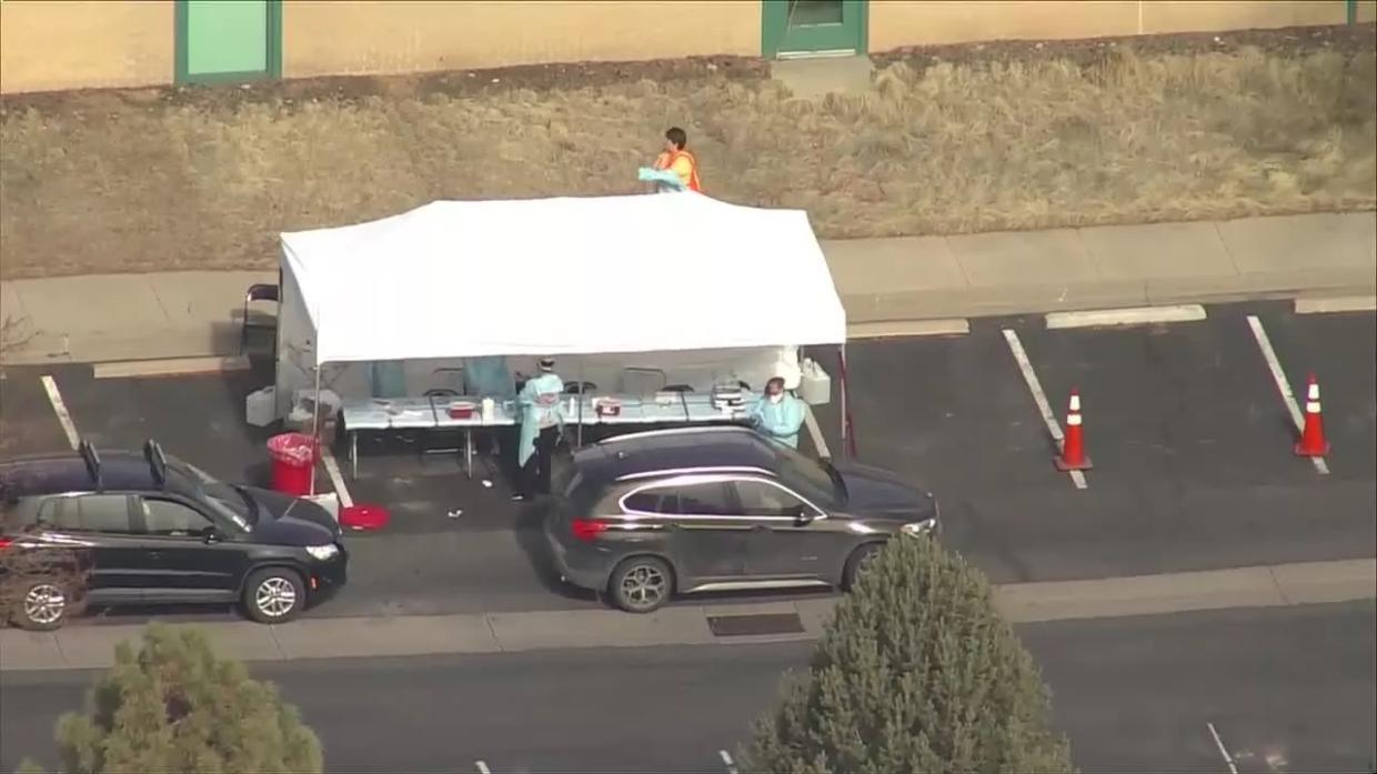 Polis Deploys National Guard to Control COVID-19 Drive-Up Lab Crowd