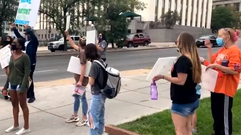 “Save Our Children” Denver Group Tries to Dodge QAnon Ties