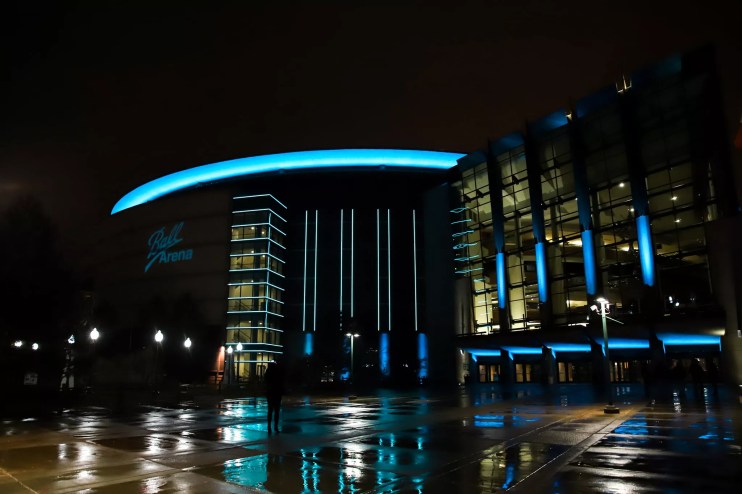 Ball Arena lit up at night in Denver