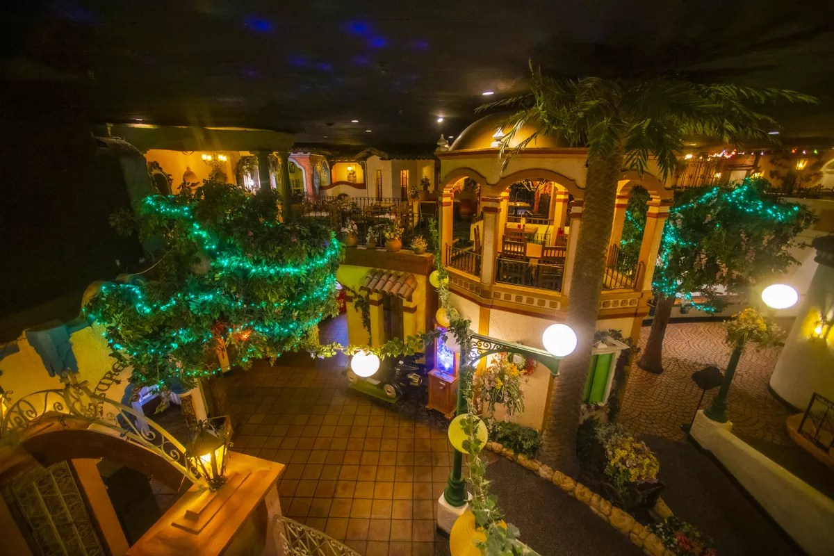interior of a restaurant made to look like a street in mexico