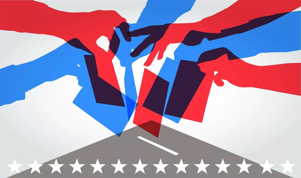 An illustration of blue and red hands putting ballots inside of a ballot box.