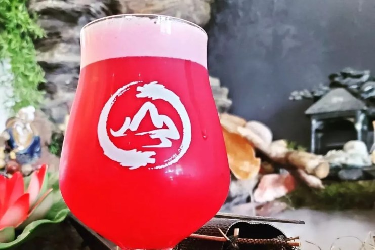 red-hused beer in a glass