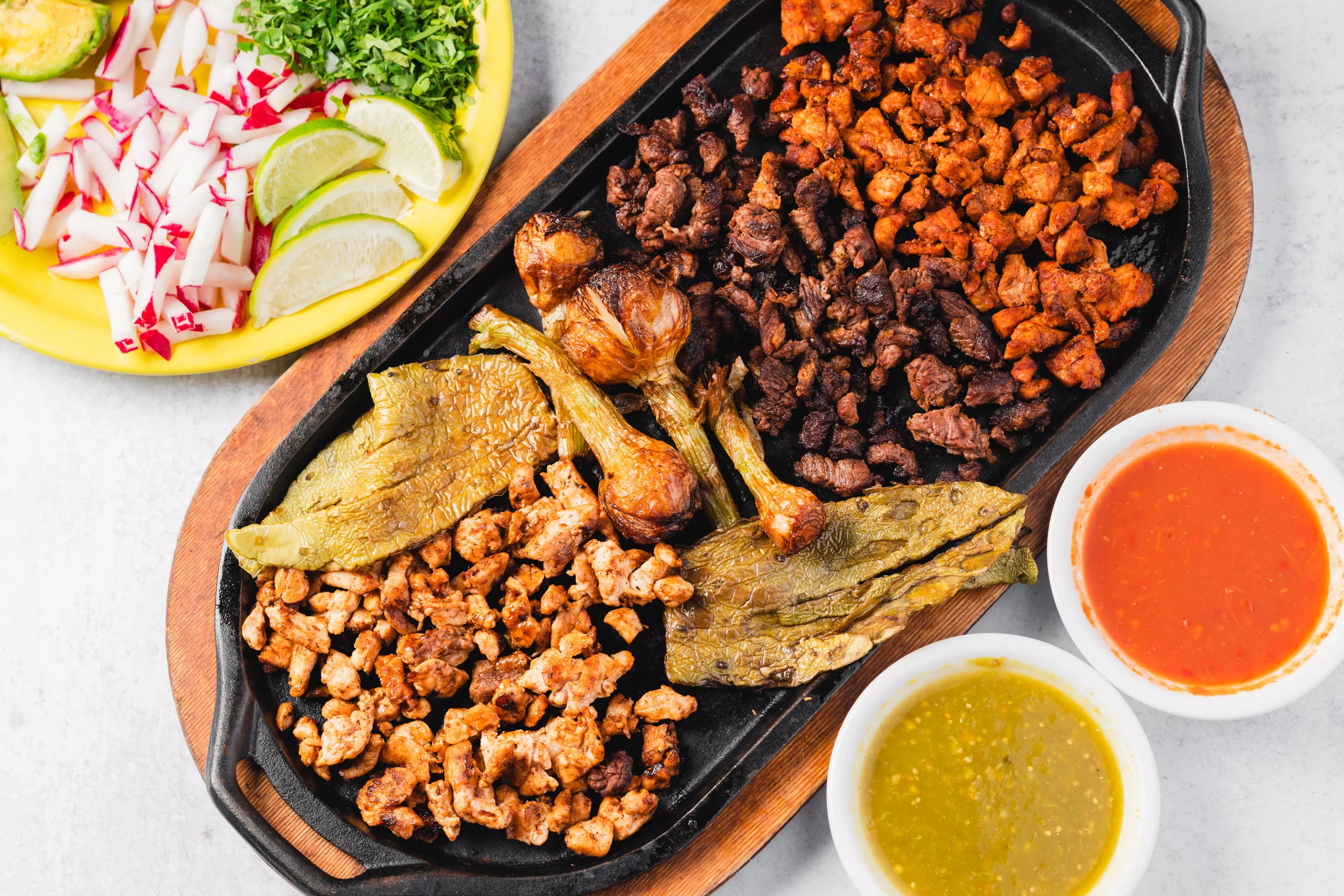 a platter of various taco meats