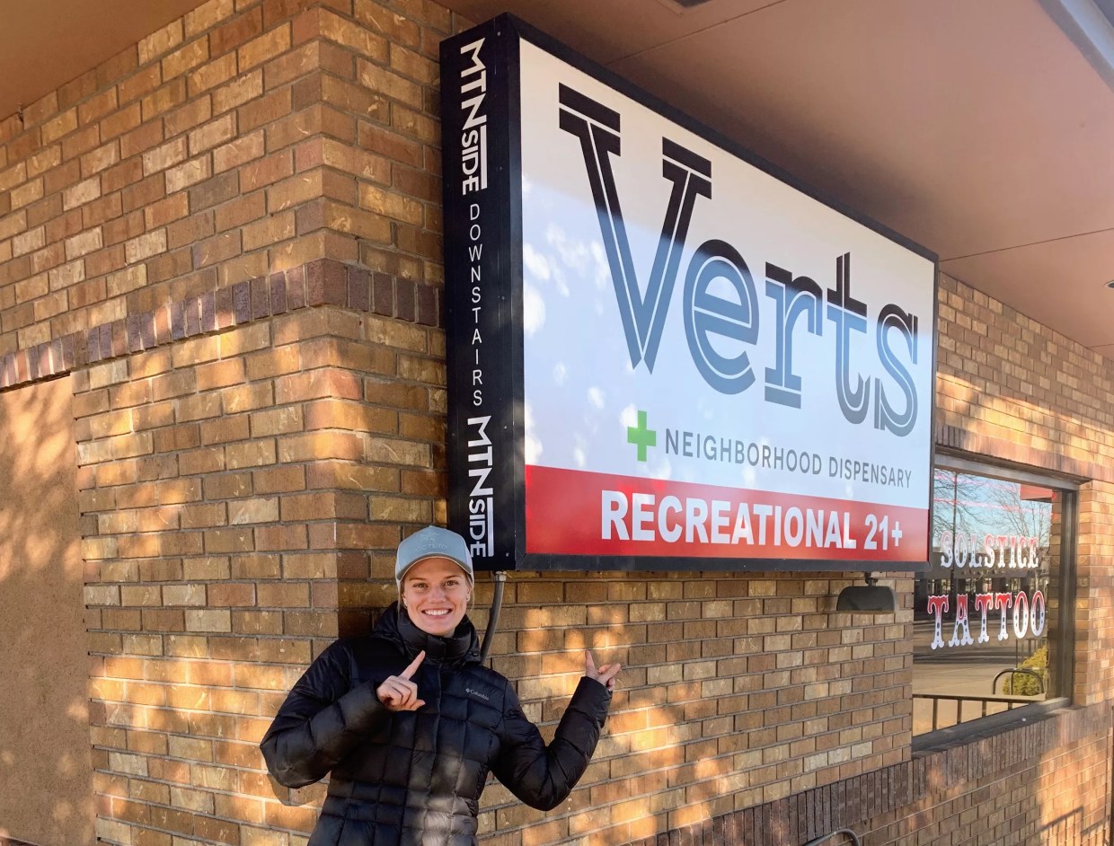 Verts Neighborhood Dispensary co-owner Ashley Close in front of her Fort Collins store.