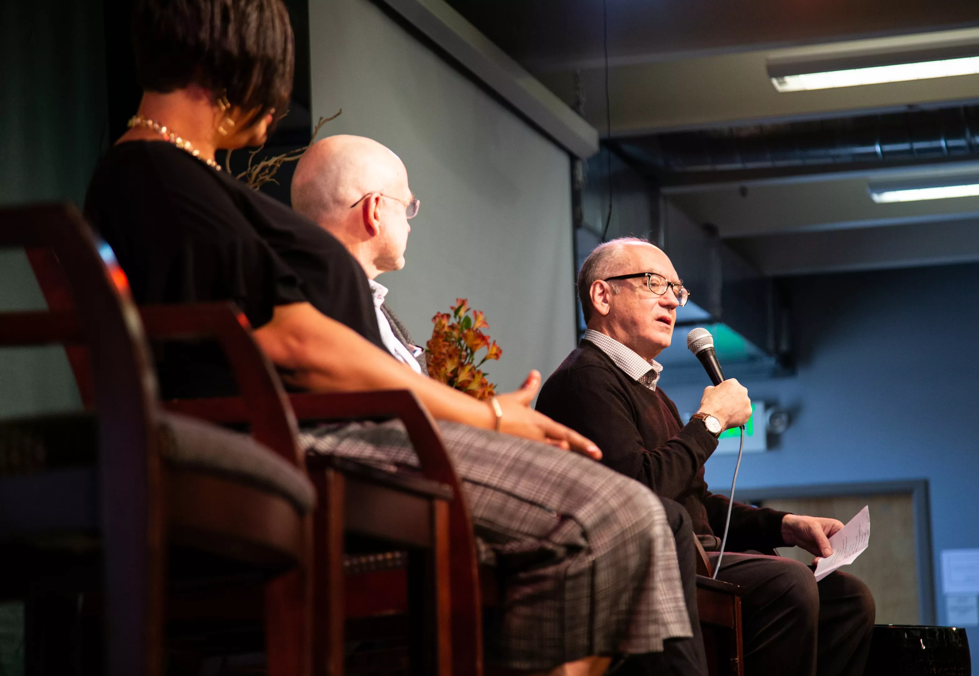 Naropa University president Charles Lief (right) speaks at a Naropa retreat in 2022.