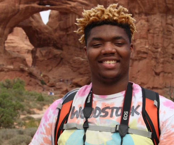 Photo of Denver resident and SCD Enrichment supervisor Ja'Brel Dorsett smiling.