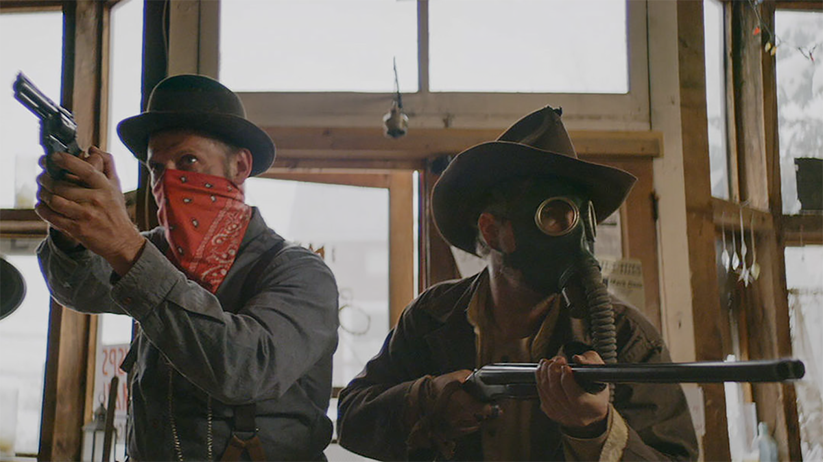 men in cowboy hats and bandanas