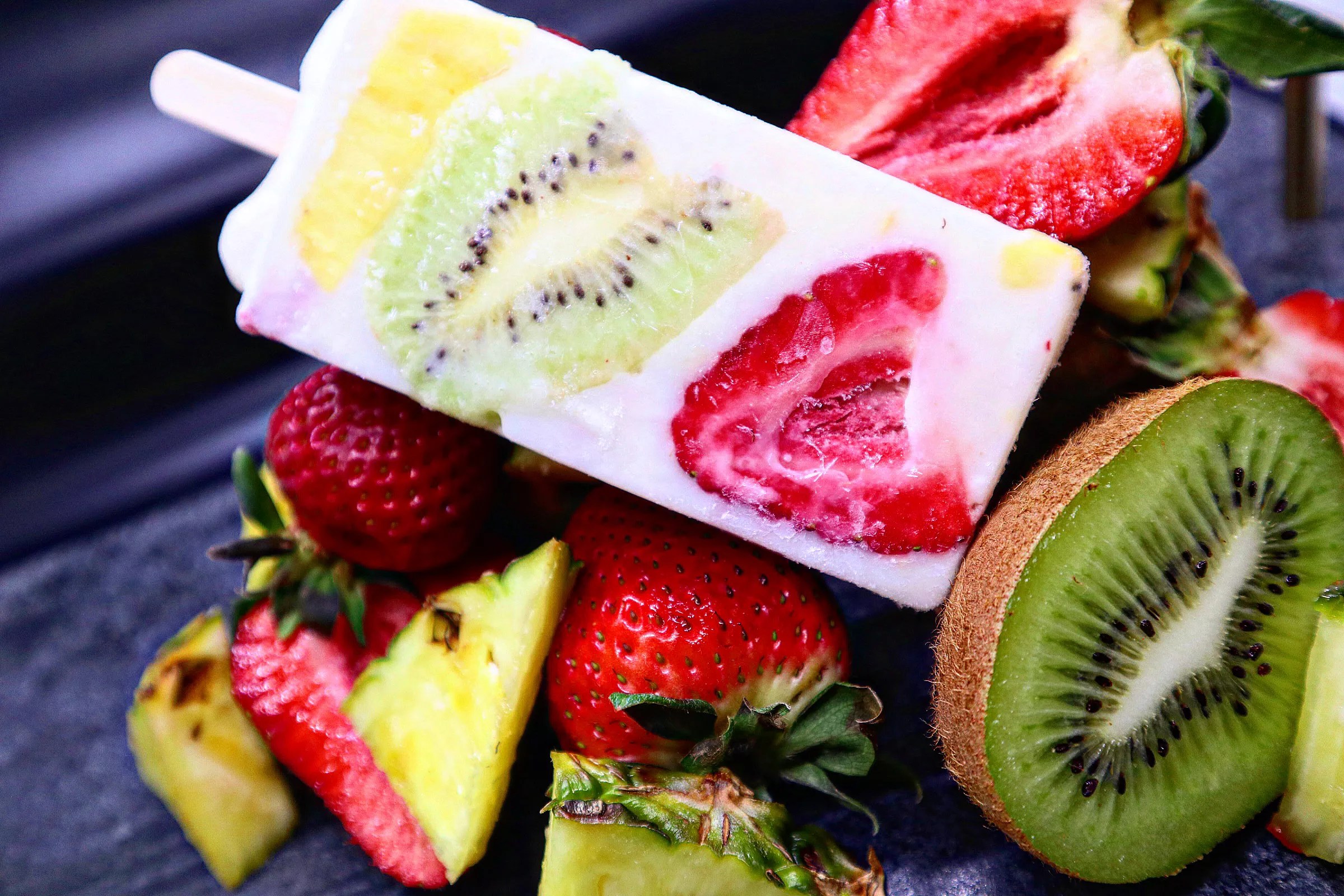 a popsicle with mixed fruit