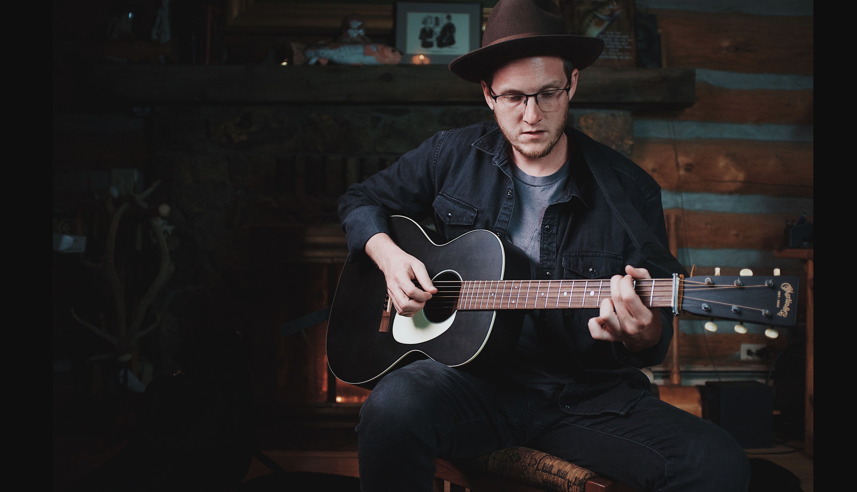 man playing a guitar