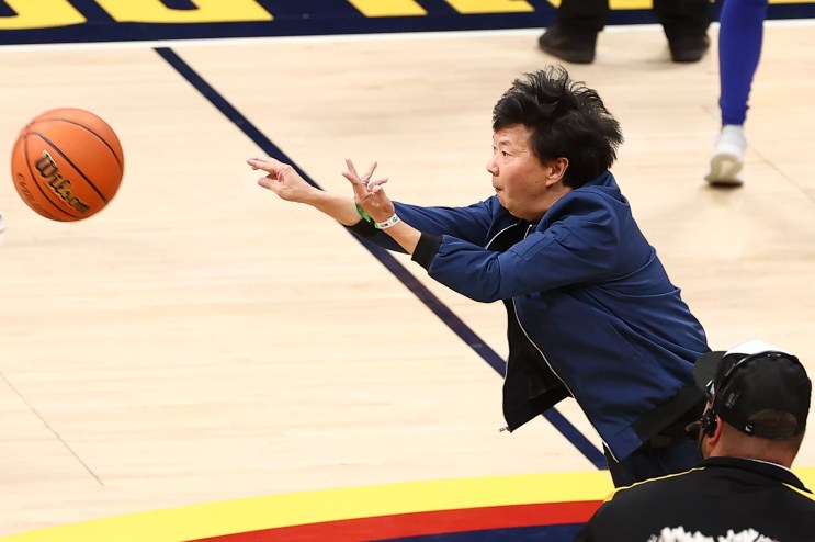 Actor and comedian Ken Jeong shooting a half-court shot at Game One of the NBA finals on June 1, 2023, in Denver, Colorado.