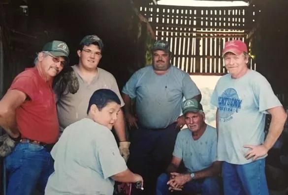 A group of workers on a Kentucky tobacco farm