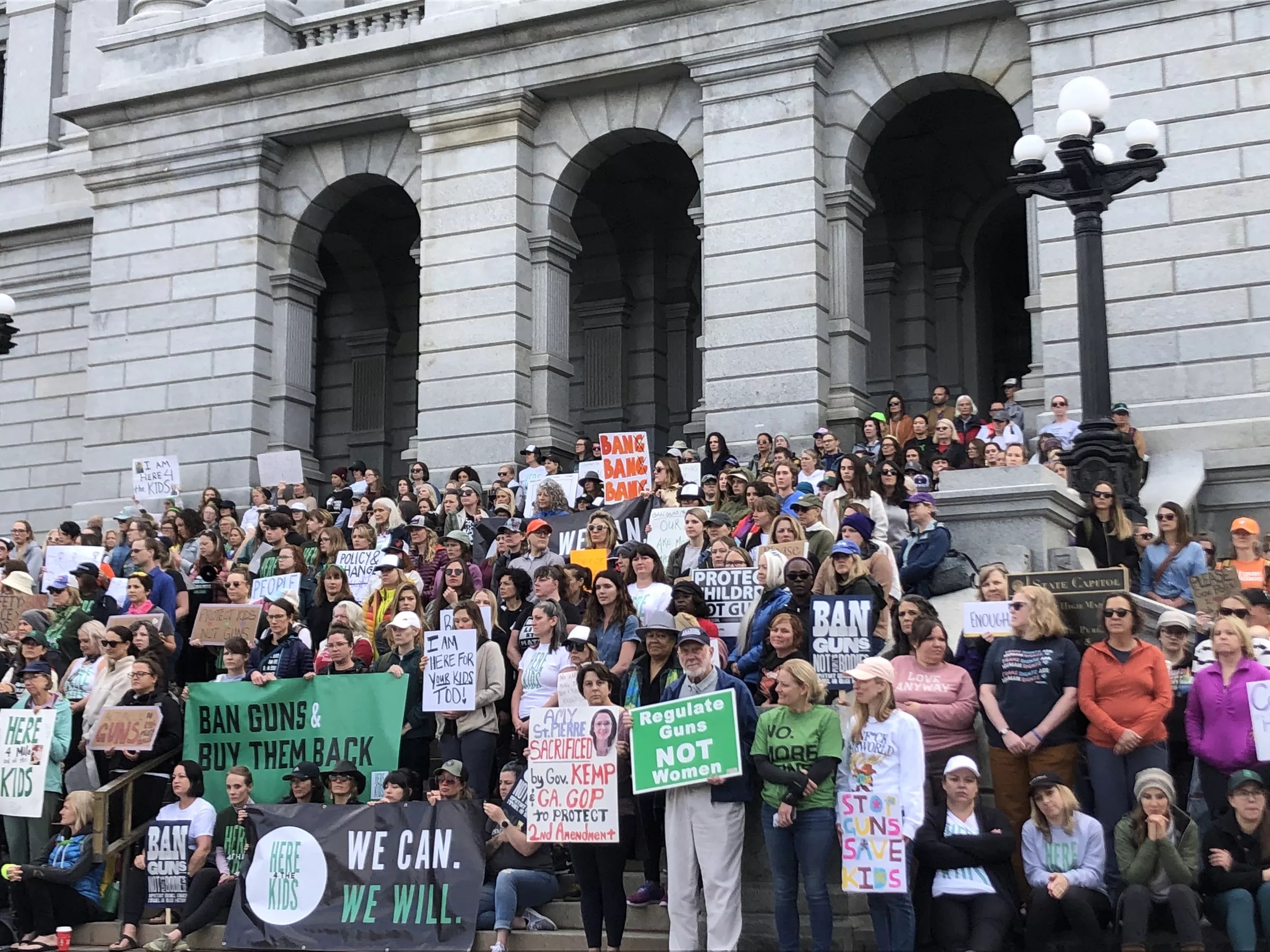 Here4TheKids protesters stand on the steps of Colorado State Capitol to demand Governor Jared Polis sign an executive  order banning guns.