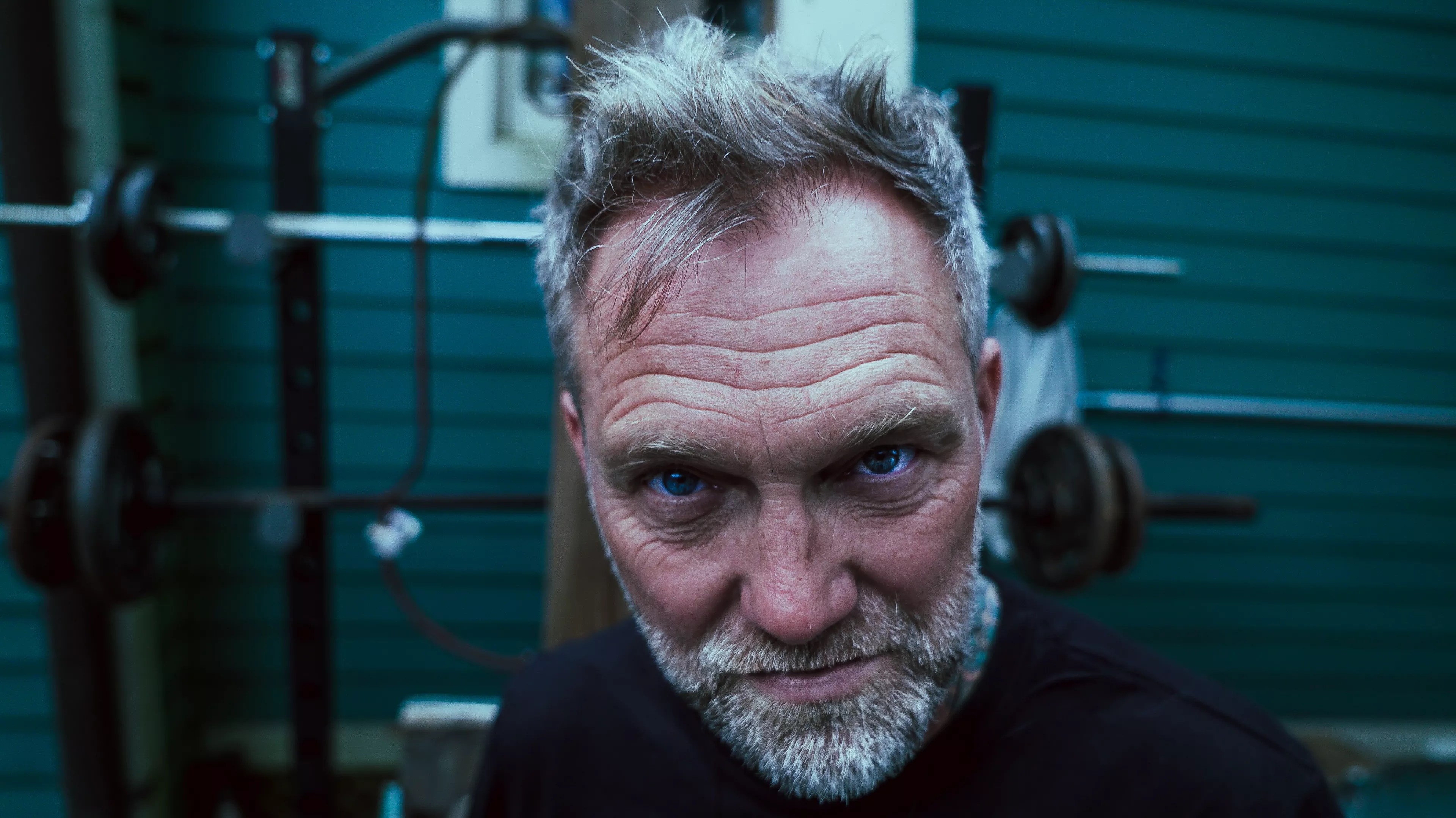 man stares at camera