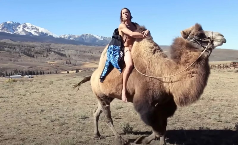 man naked on camel