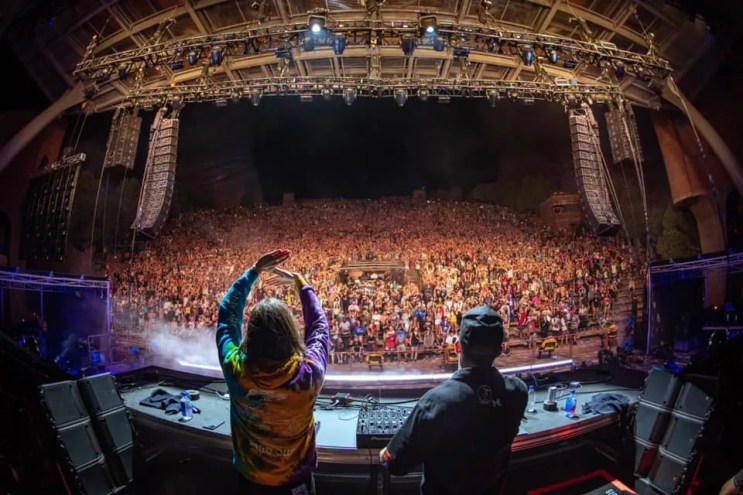 two djs play for a crowd