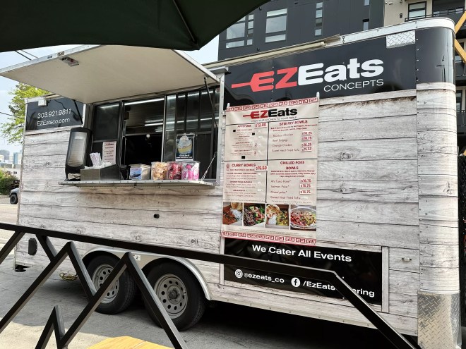 a food truck with its ordering window open
