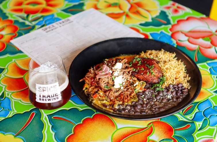 Smoked brisket, rice, beans, plantains and beer.