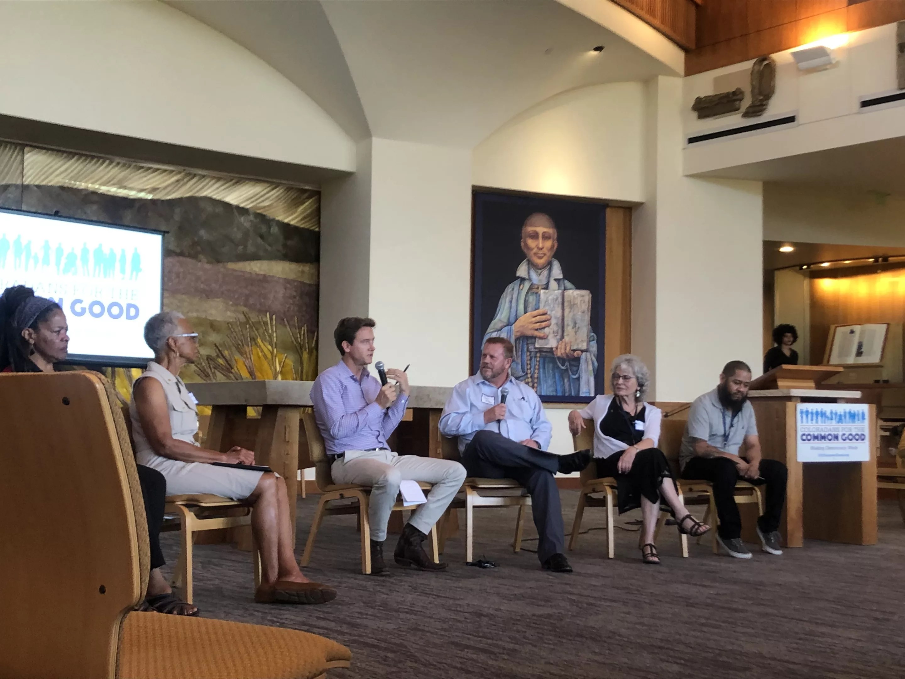 Mike Johnston at a Coloradans for the Common Good forum on July 12.