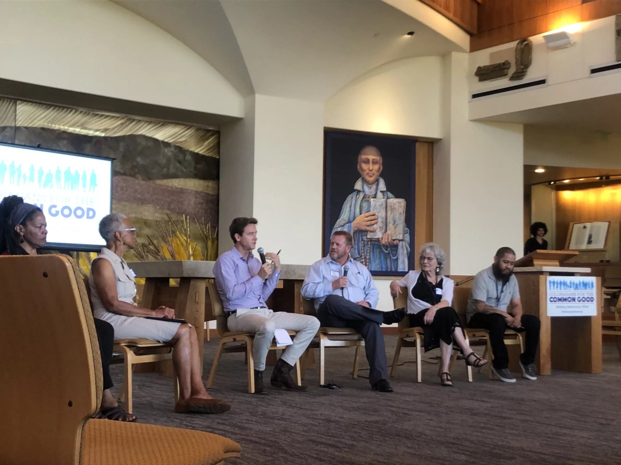 Mike Johnston at a Coloradans for the Common Good forum on July 12.