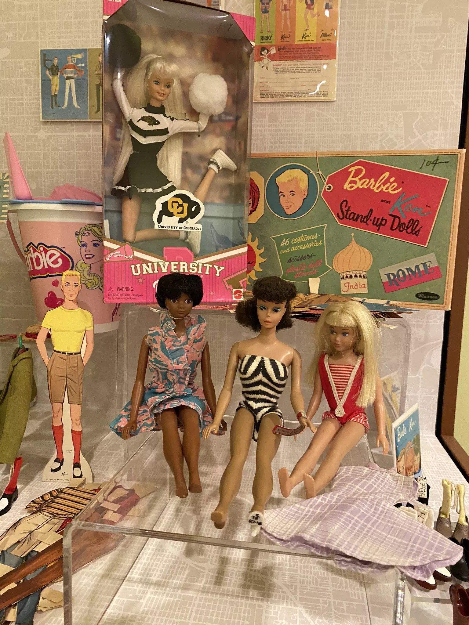 vintage barbies and accessories in a box