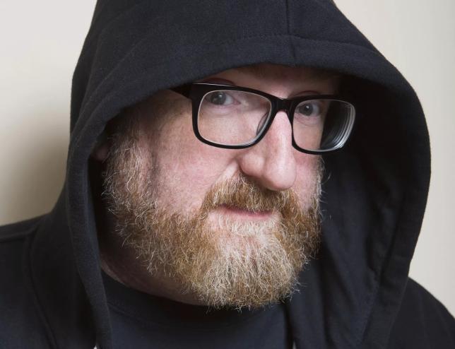 man with beard in hood
