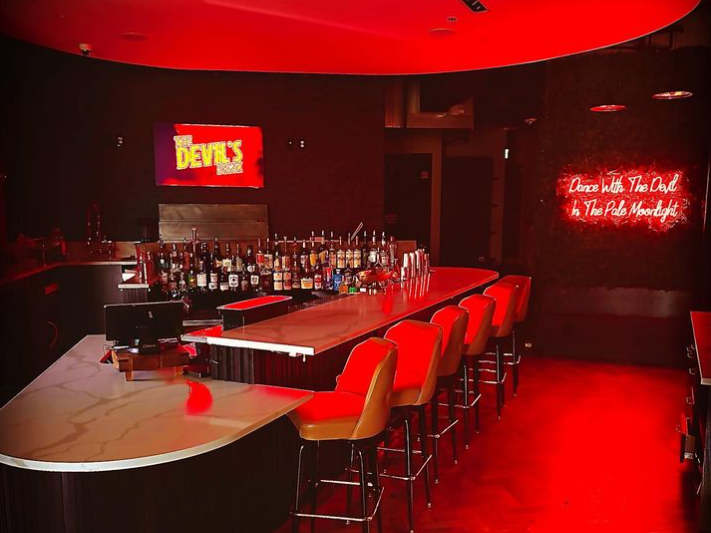 a bar with red lights