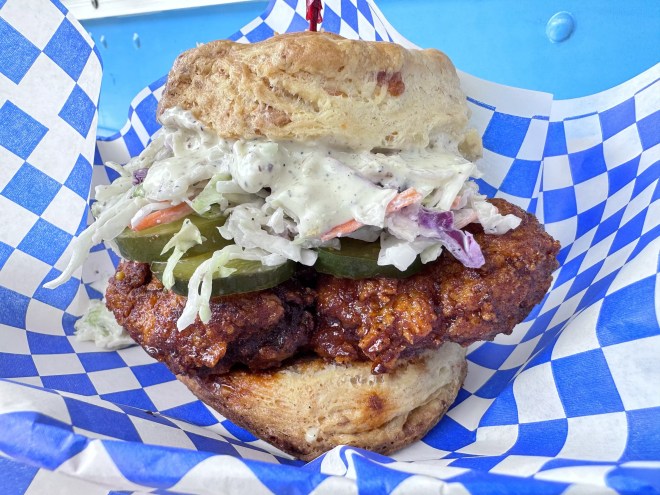 fried chicken and coleslaw on a biscuit