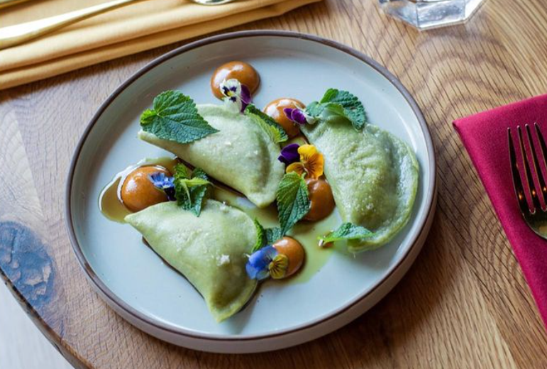 three pierogi on a plate