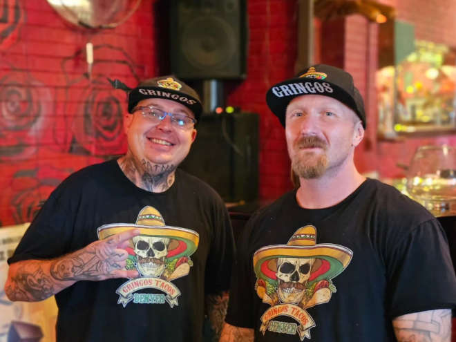 two men in baseball caps