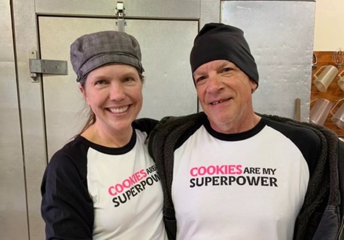 a man and a woman smiling