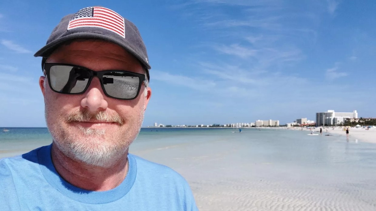 man in sunglasses on beach
