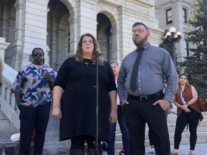 Kevin and Laura Poss speak at a press conference on September 7.