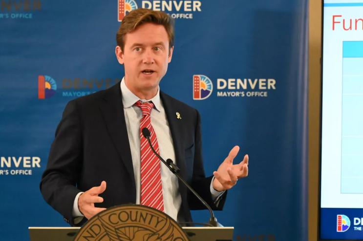 Mayor Mike Johnston speaks about funding for his housing plan.