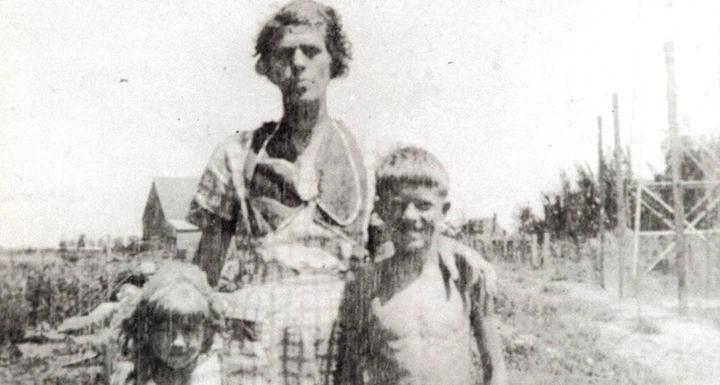woman and two children on farm