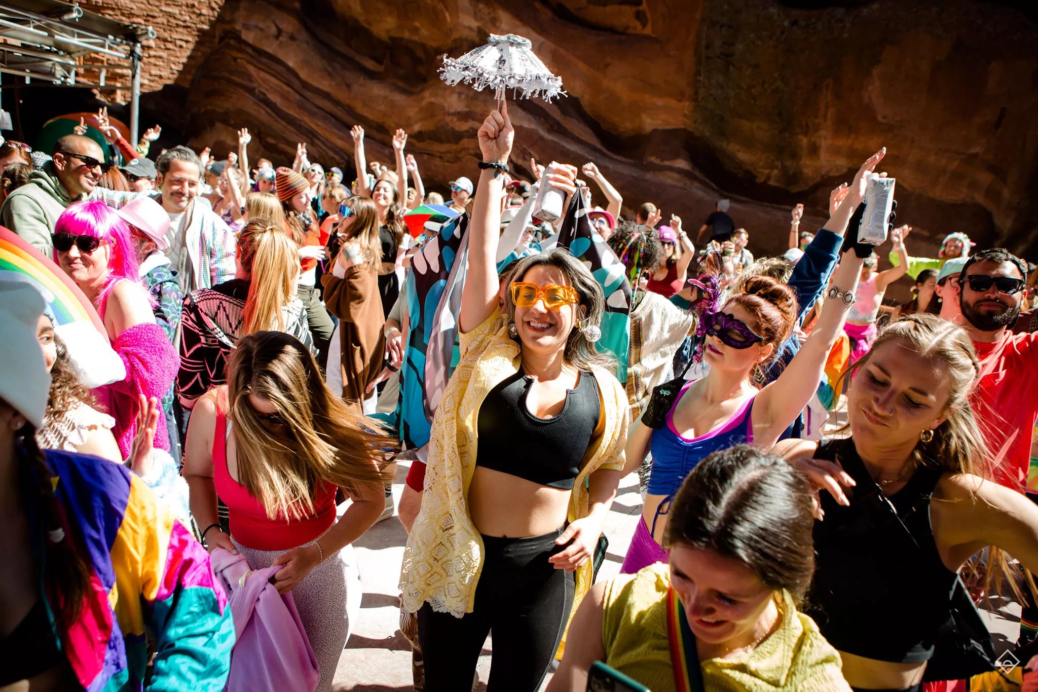 women dancing at red rocks amphitheatre