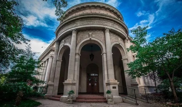 a neo-classical building with columns
