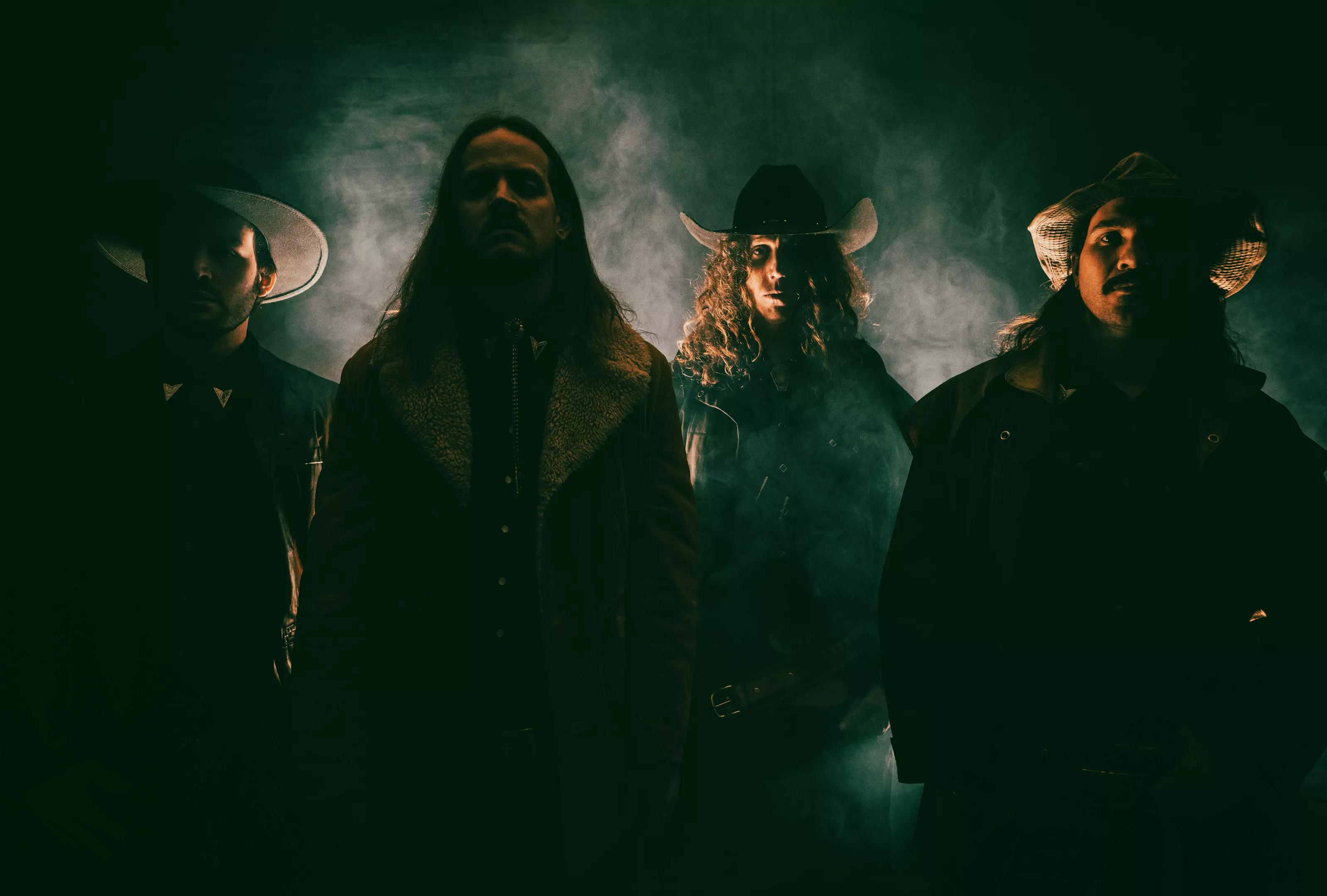 band members wearing western wear for a photo shoot
