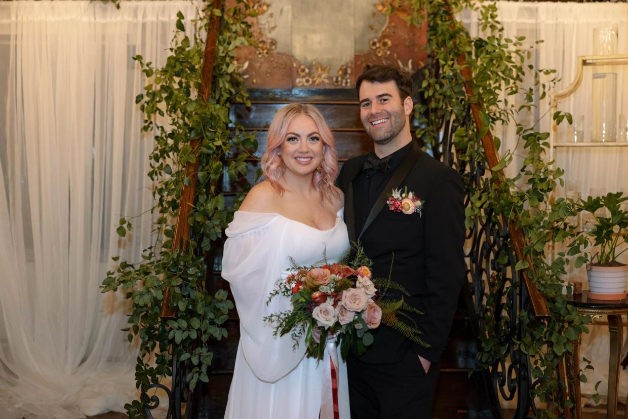 Becca and Austin pose for wedding portraits