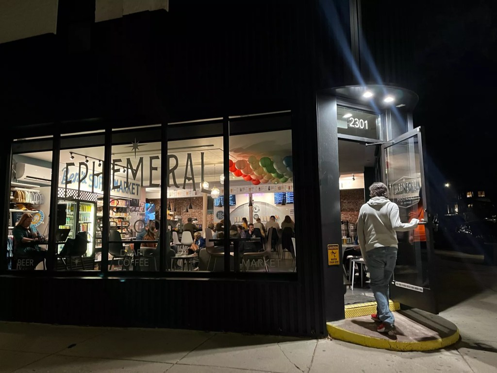 person walking into a taptoom