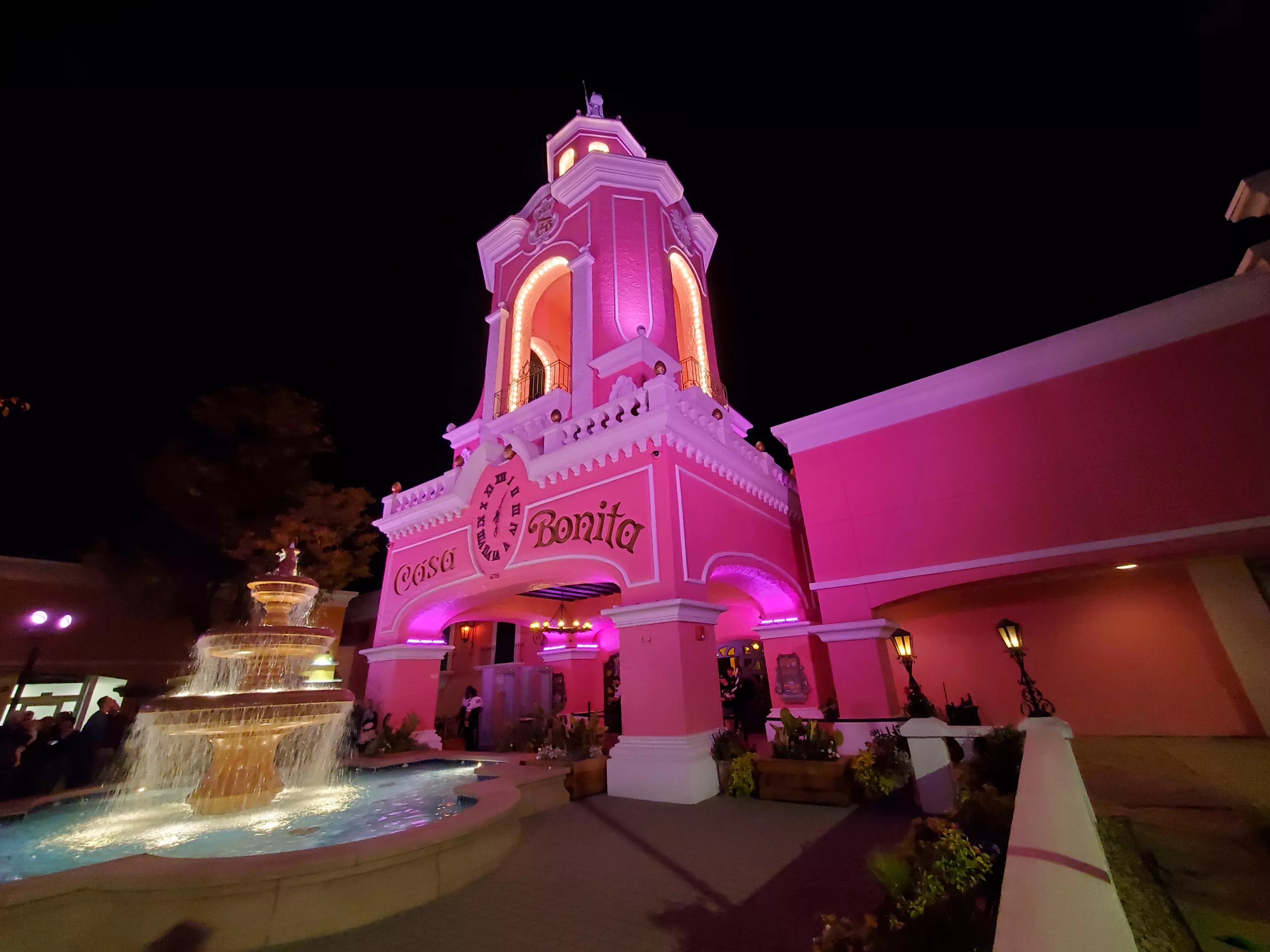 pink restaurant that looks like old Mexico at night