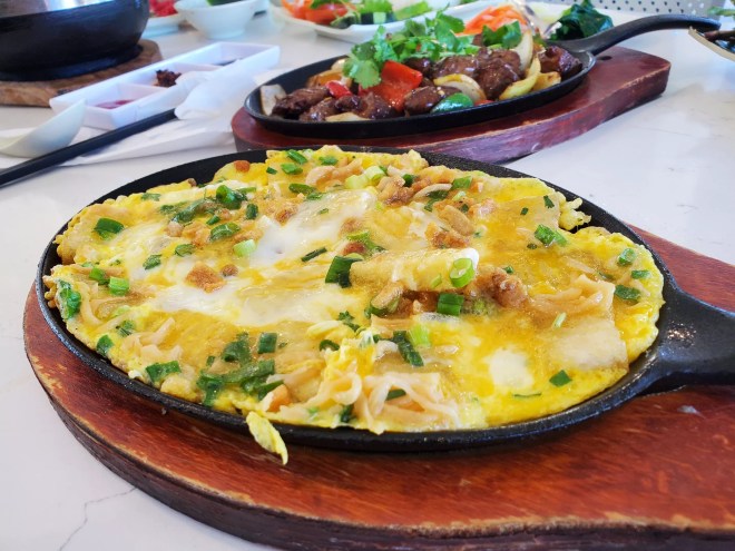 an omelet with rice makes on a skillet