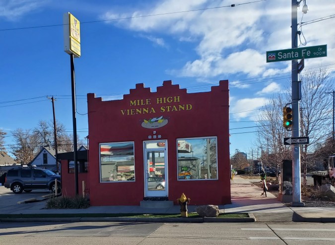 front of a red building