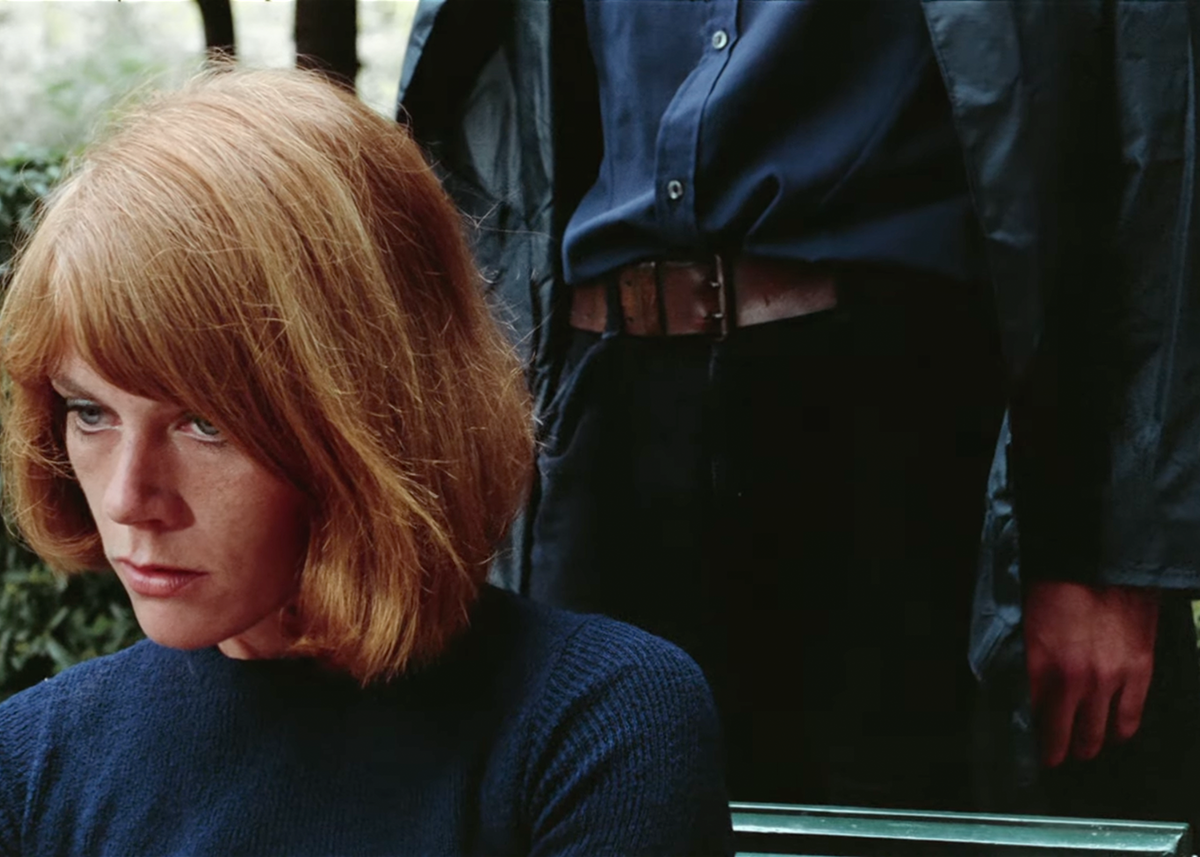 woman with a man standing behind him