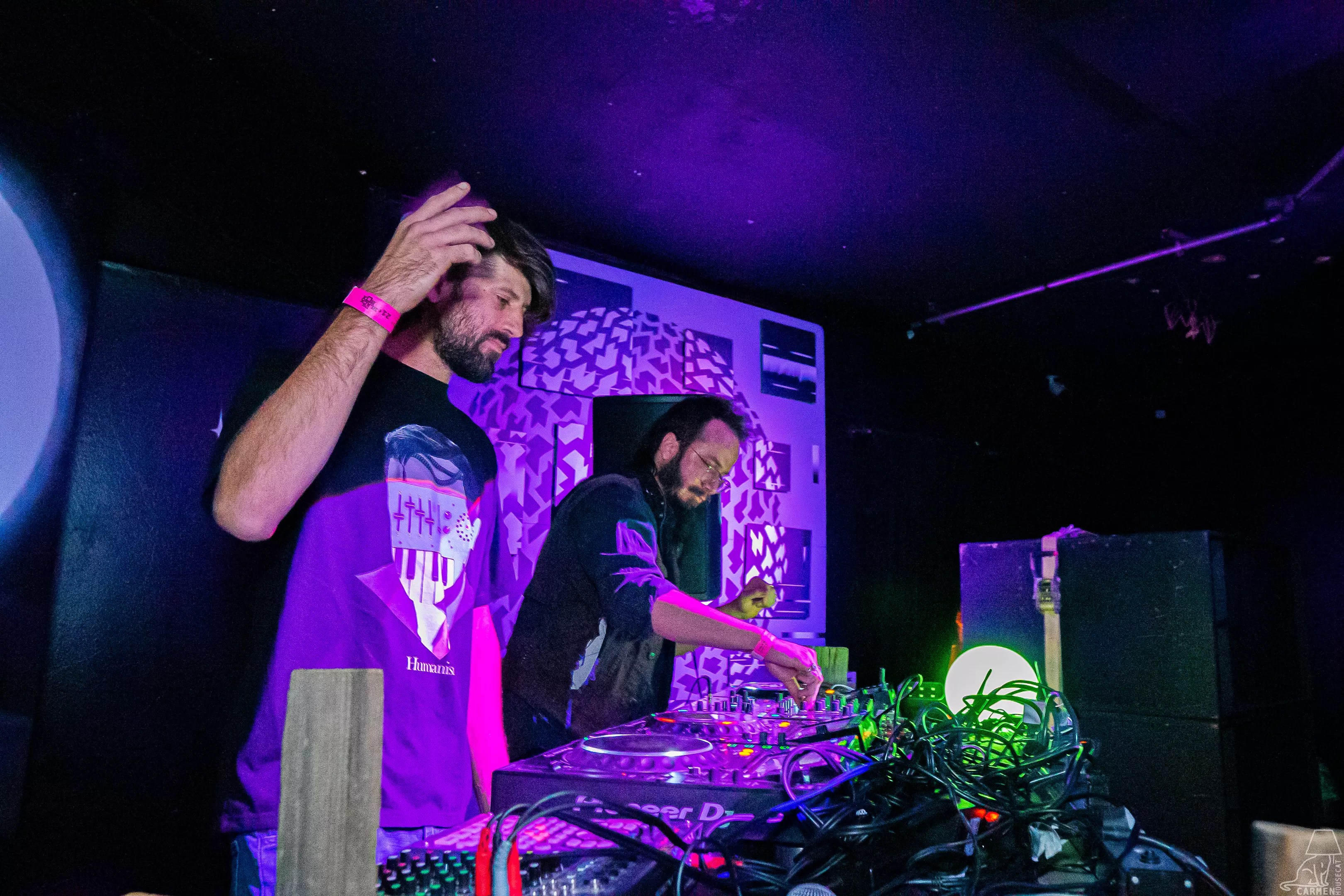 DJs spinning at the decks