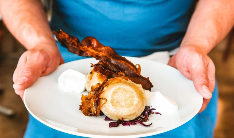 pierogi and bacon on a plate