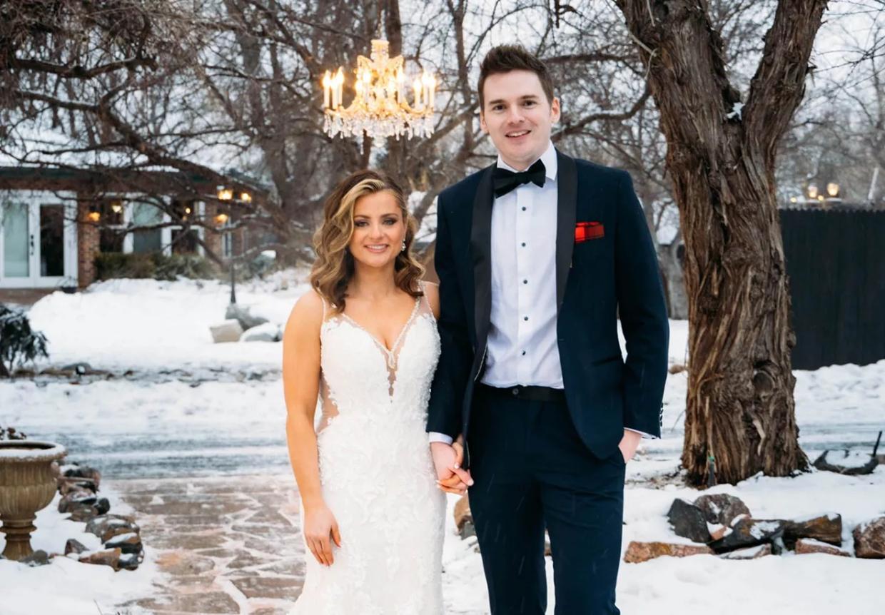 bride and groom in snow