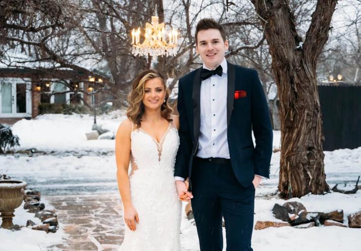 bride and groom in snow