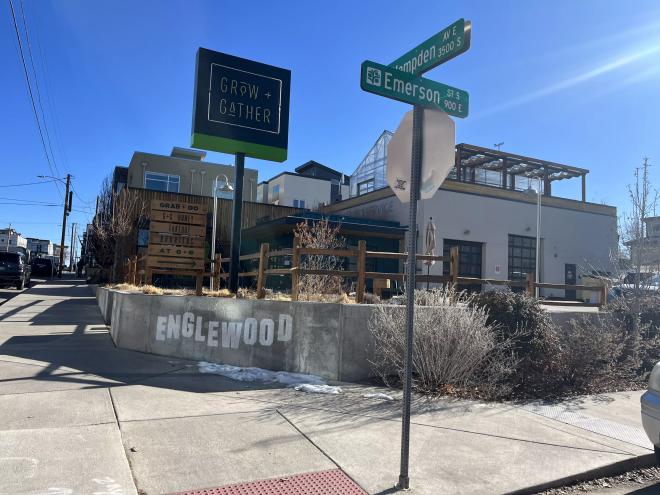 a street sign in front of a building